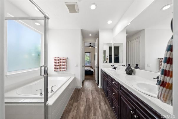 Bathroom, Dual Sink Vanities, Interior, Recessed Lighting, Tile Countertops, Wood Texture Flooring