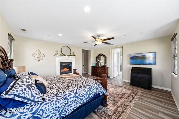 Bedroom, Fireplace, Interior, Recessed Lighting, Wood Texture Flooring