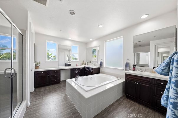 Bathroom, Dual Sink Vanities, Interior, Recessed Lighting, Wood Texture Flooring