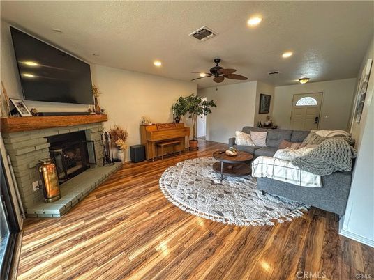 Fireplace, Interior, Living room, Recessed Lighting, Wood Texture Flooring