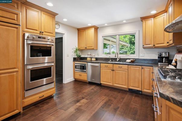 Interior, Kitchen, Recessed Lighting, Stainless Steel Appliances, Wood Texture Flooring