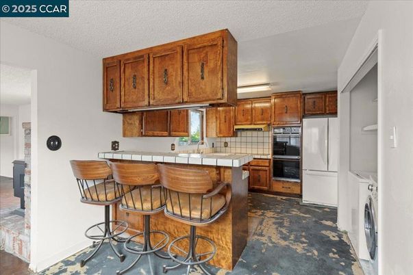 Interior, Kitchen, Tile Countertops, Washer