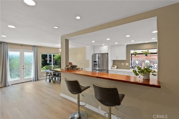 Dining room, Interior, Kitchen, Recessed Lighting, Stainless Steel Appliances, Wood Texture Flooring