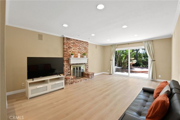 Fireplace, Interior, Recessed Lighting, Stone Walls, Wood Texture Flooring