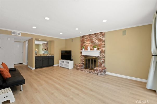 Fireplace, Interior, Recessed Lighting, Stone Walls, Wood Texture Flooring