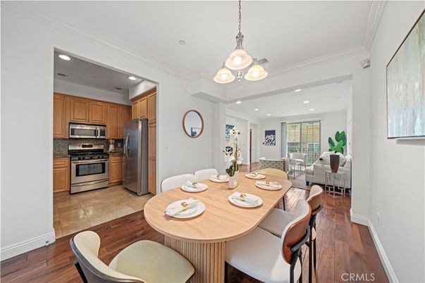 Dining room, Interior, Kitchen, Pendant Lights, Recessed Lighting, Stainless Steel Appliances, Wood Texture Flooring