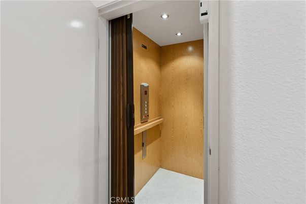 Elevator, Interior, Recessed Lighting, Wooden Walls