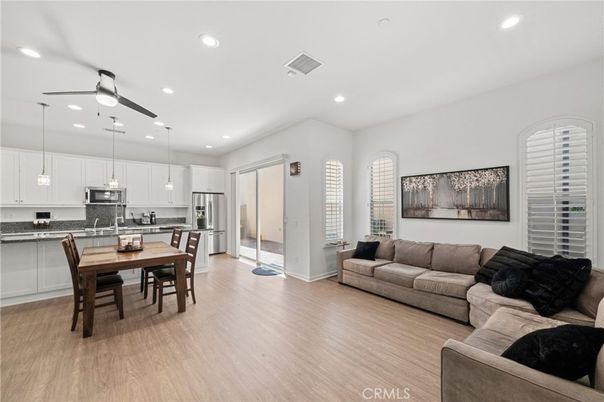 Dining room, Interior, Kitchen, Living room, Pendant Lights, Recessed Lighting, Stainless Steel Appliances, Wood Texture Flooring