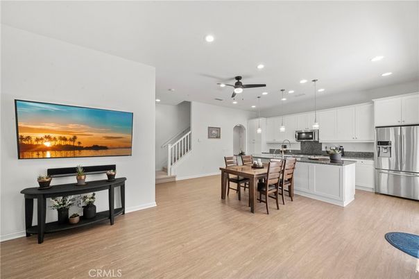 Dining room, Interior, Kitchen, Pendant Lights, Recessed Lighting, Stainless Steel Appliances, Wood Texture Flooring