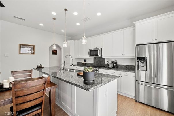 Interior, Kitchen, Pendant Lights, Recessed Lighting, Stainless Steel Appliances, Wood Texture Flooring