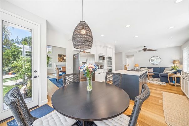 Dining room, Interior, Kitchen, Living room, Pendant Lights, Recessed Lighting, Stainless Steel Appliances, Wood Texture Flooring