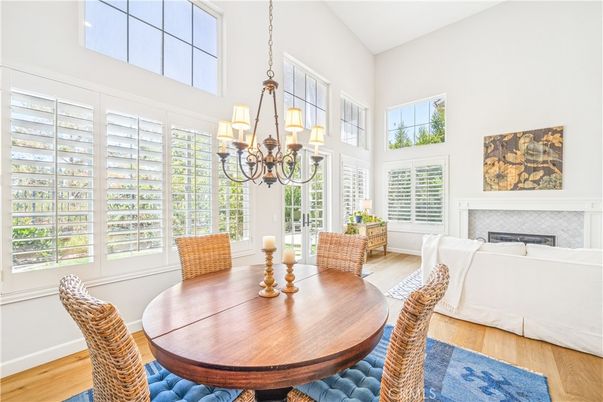 Chandelier, Dining room, Fireplace, Interior, Pendant Lights, Wood Texture Flooring