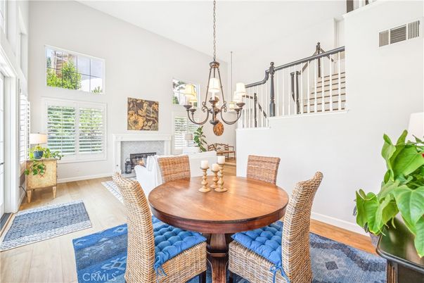 Chandelier, Dining room, Fireplace, Interior, Pendant Lights, Wood Texture Flooring