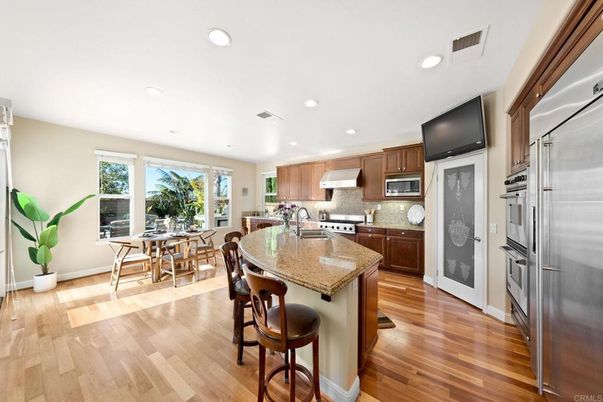 Dining room, Interior, Kitchen, Recessed Lighting, Stainless Steel Appliances, Wood Texture Flooring