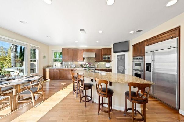 Dining room, Interior, Kitchen, Recessed Lighting, Stainless Steel Appliances, Wood Texture Flooring