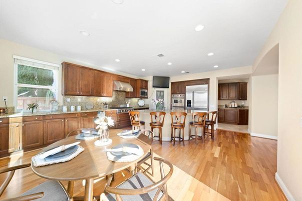 Dining room, Interior, Kitchen, Recessed Lighting, Stainless Steel Appliances, Wood Texture Flooring