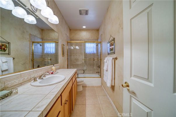 Bathroom, Dual Sink Vanities, Glass Shower, Interior, Recessed Lighting, Tile Countertops
