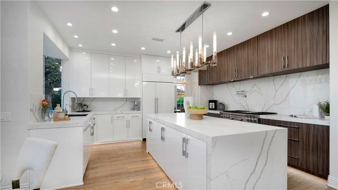 Interior, Kitchen, Marble Walls, Pendant Lights, Recessed Lighting, Stainless Steel Appliances, Wood Texture Flooring