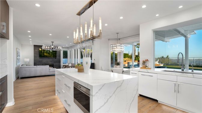 Chandelier, Dining room, Fireplace, Interior, Kitchen, Living room, Pendant Lights, Recessed Lighting, Wood Texture Flooring