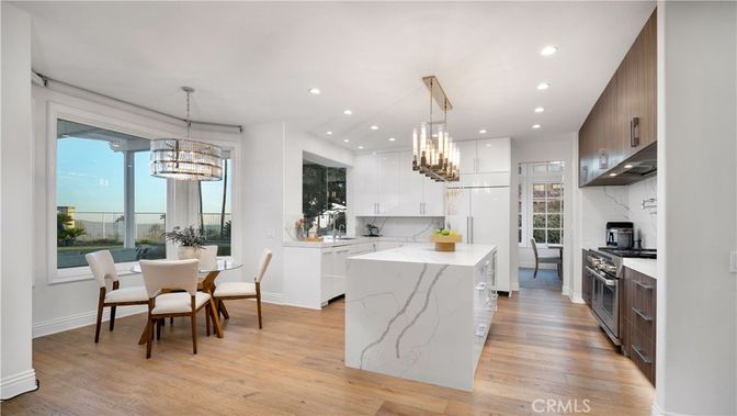 Chandelier, Dining room, Interior, Kitchen, Pendant Lights, Recessed Lighting, Stainless Steel Appliances, Wood Texture Flooring