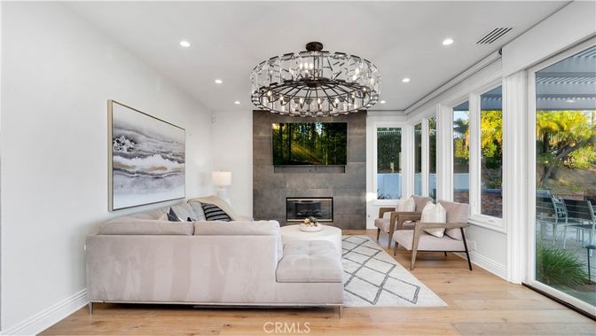 Chandelier, Fireplace, Interior, Living room, Recessed Lighting, Wood Texture Flooring