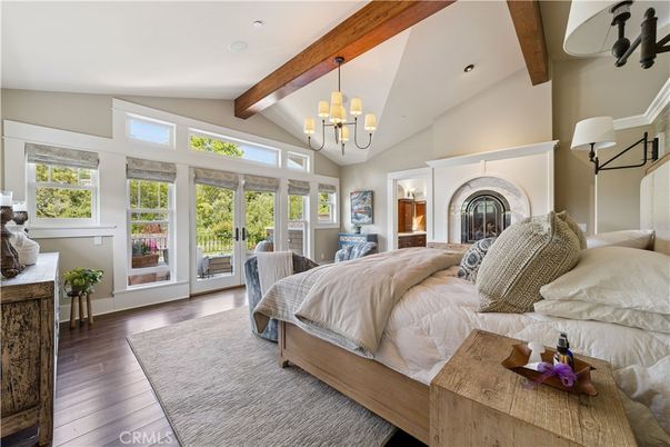 Bedroom, Chandelier, Fireplace, Interior, Recessed Lighting, Wooden Beams, Wood Texture Flooring