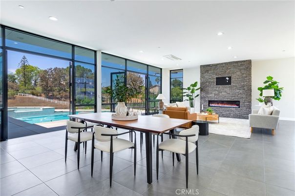 Dining room, Fireplace, Interior, Living room, Recessed Lighting, Stone Walls