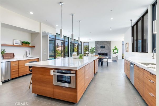Dining room, Fireplace, Interior, Kitchen, Pendant Lights, Recessed Lighting, Stainless Steel Appliances, Stone Walls