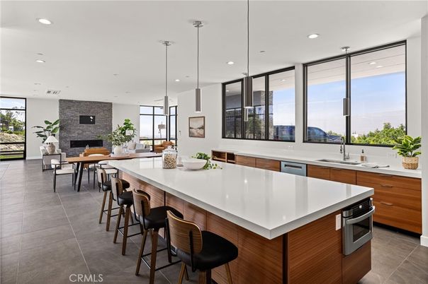 Dining room, Fireplace, Interior, Kitchen, Pendant Lights, Recessed Lighting, Stainless Steel Appliances, Stone Walls