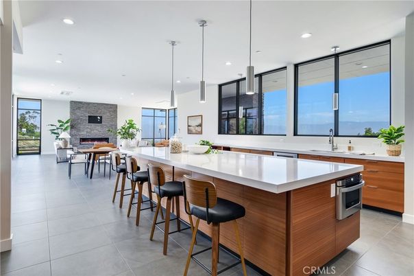 Dining room, Fireplace, Interior, Kitchen, Pendant Lights, Recessed Lighting, Stainless Steel Appliances, Stone Walls, Water