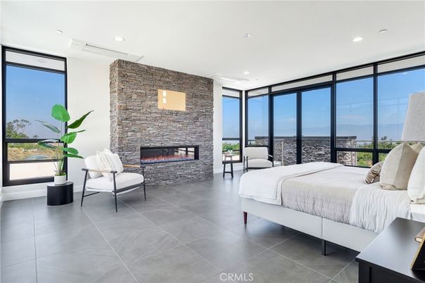 Bedroom, Fireplace, Interior, Recessed Lighting, Stone Walls, Water