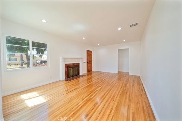 Empty room, Fireplace, Interior, Recessed Lighting, Wood Texture Flooring