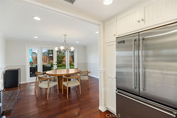 Chandelier, Dining room, Interior, Kitchen, Recessed Lighting, Stainless Steel Appliances, Wood Texture Flooring