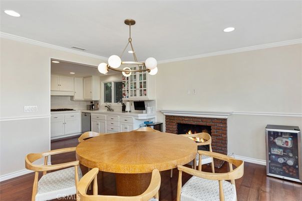 Dining room, Fireplace, Interior, Kitchen, Pendant Lights, Recessed Lighting, Wood Texture Flooring