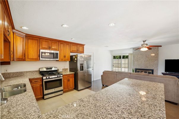 Fireplace, Interior, Kitchen, Recessed Lighting, Stainless Steel Appliances