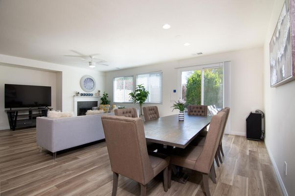 Dining room, Fireplace, Interior, Living room, Recessed Lighting, Wood Texture Flooring
