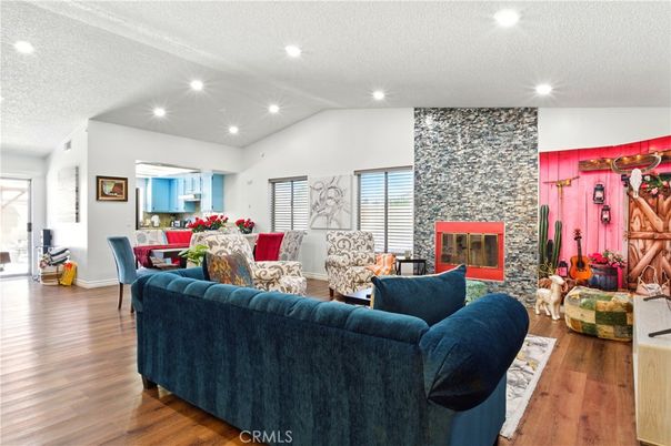 Dining room, Fireplace, Interior, Living room, Recessed Lighting, Wood Texture Flooring