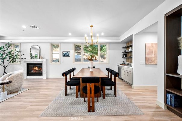 Chandelier, Dining room, Fireplace, Interior, Pendant Lights, Recessed Lighting, Wood Texture Flooring