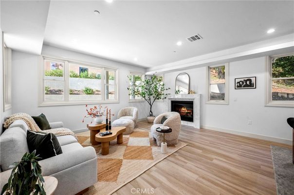 Fireplace, Interior, Living room, Recessed Lighting, Wood Texture Flooring