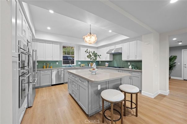 Interior, Kitchen, Pendant Lights, Recessed Lighting, Stainless Steel Appliances, Wood Texture Flooring