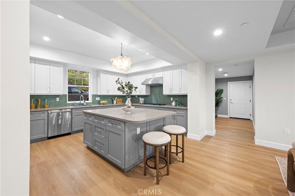 Chandelier, Interior, Kitchen, Pendant Lights, Recessed Lighting, Stainless Steel Appliances, Wood Texture Flooring