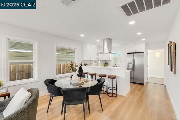 Dining room, Interior, Kitchen, Recessed Lighting, Stainless Steel Appliances, Wood Texture Flooring
