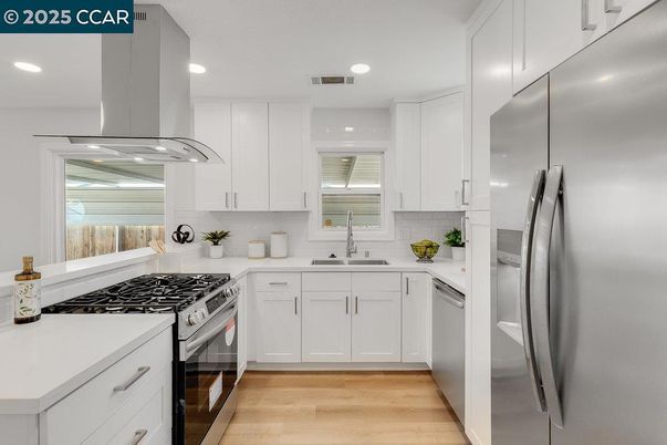 Interior, Kitchen, Recessed Lighting, Stainless Steel Appliances, Wood Texture Flooring