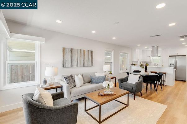 Dining room, Interior, Kitchen, Living room, Recessed Lighting, Stainless Steel Appliances, Wood Texture Flooring