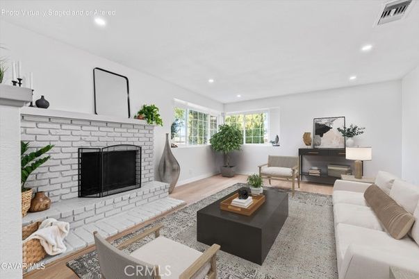 Fireplace, Interior, Living room, Recessed Lighting, Stone Walls, Wood Texture Flooring