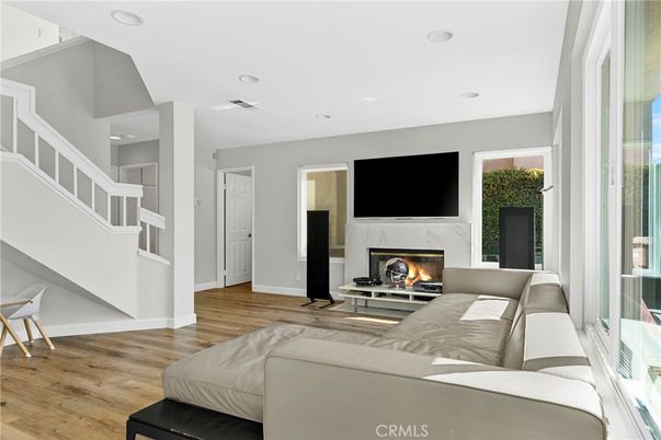 Fireplace, Interior, Living room, Recessed Lighting, Wood Texture Flooring