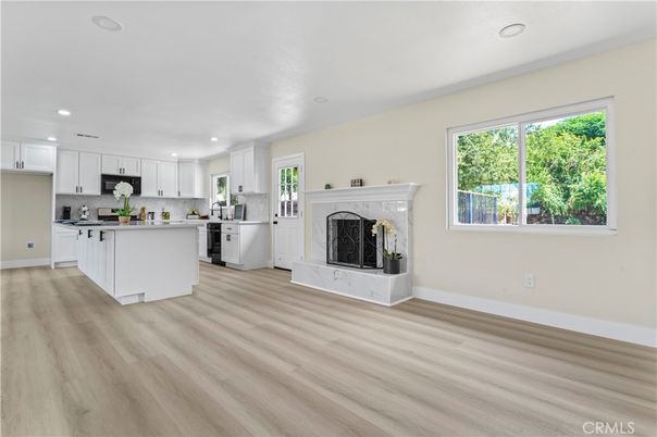 Fireplace, Interior, Kitchen, Recessed Lighting, Wood Texture Flooring