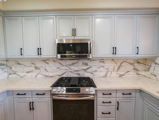 Interior, Kitchen, Marble Walls, Stainless Steel Appliances