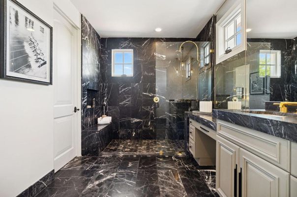 Bathroom, Dual Sink Vanities, Glass Shower, Interior, Marble, Marble Walls, Recessed Lighting