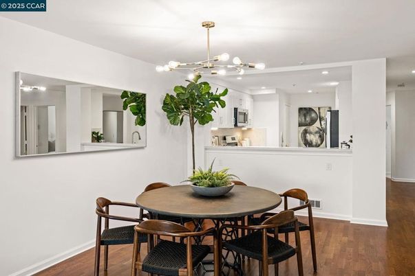 Dining room, Interior, Kitchen, Pendant Lights, Recessed Lighting, Stainless Steel Appliances, Wood Texture Flooring